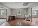 Functional room with tile flooring, sink, and window offering natural light in a basic setting at 7117 Stonebrook Cv, Lithonia, GA 30058