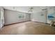 Room featuring window and outdoor access suitable for a utility space or creative renovation at 7117 Stonebrook Cv, Lithonia, GA 30058