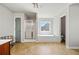 Bathroom featuring a soaking tub with a window, a tiled shower, and grey walls at 1657 Preserve Park Dr, Loganville, GA 30052