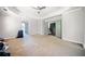Large main bedroom featuring tray ceilings and an open layout leading to the ensuite bathroom at 1657 Preserve Park Dr, Loganville, GA 30052