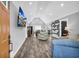 Inviting living room featuring vaulted ceiling, hardwood floors, and an open floor plan at 1660 Rose Garden Ln, Loganville, GA 30052