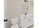 Bathroom features a white vanity, modern sink, and a neutral color palette to create a calm and clean atmosphere at 1995 Deco Dr, Kennesaw, GA 30144