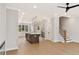 Open-concept living area combines the kitchen, dining, and living spaces, complete with hardwood floors at 1995 Deco Dr, Kennesaw, GA 30144