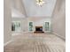 Open living area with fireplace and multiple windows, providing an abundance of natural light at 3171 Blairhill Ct, Atlanta, GA 30340