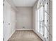 Spacious walk-in closet with built-in shelving and a bright window at 3171 Blairhill Ct, Atlanta, GA 30340