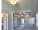 Bedroom featuring trey ceiling with fan, neutral walls, carpet and ensuite bath at 3745 Reserve Overlook (#30) Way, Cumming, GA 30041