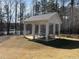 Community gazebo with picnic tables offers a serene spot for outdoor gatherings overlooking the water surrounded by mature trees at 3745 Reserve Overlook (#30) Way, Cumming, GA 30041