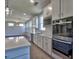 Spacious kitchen with a large island, stainless steel appliances, and an adjoining dining area at 3745 Reserve Overlook (#30) Way, Cumming, GA 30041