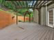 Inviting back deck with a pergola and access to the backyard, perfect for outdoor entertaining at 4515 N. Slope Cir, Marietta, GA 30066