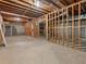 Unfinished basement with exposed framing and concrete flooring, offering potential for customization at 4515 N. Slope Cir, Marietta, GA 30066