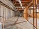 Unfinished basement with concrete walls and exposed wood framing, ready for customization at 4515 N. Slope Cir, Marietta, GA 30066