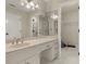 Spacious bathroom with a long vanity, multiple mirrors, and access to a walk-in closet at 4515 N. Slope Cir, Marietta, GA 30066