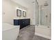 Modern bathroom featuring a double vanity, soaking tub, and glass-enclosed shower at 4515 N. Slope Cir, Marietta, GA 30066
