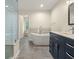 Well-appointed bathroom with a freestanding tub, walk-in shower, and stylish double vanity at 4515 N. Slope Cir, Marietta, GA 30066