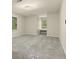 Bright bedroom with neutral walls and carpet, featuring two large windows at 4515 N. Slope Cir, Marietta, GA 30066