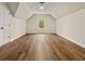Spacious bonus room with high ceilings, wood floors, and natural light at 4515 N. Slope Cir, Marietta, GA 30066