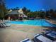 Community pool with lounge chairs and a well-maintained deck at 4515 N. Slope Cir, Marietta, GA 30066