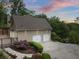 A two-car garage with a paved driveway provides ample parking at 4515 N. Slope Cir, Marietta, GA 30066