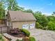 A two-car garage with a paved driveway provides ample parking at 4515 N. Slope Cir, Marietta, GA 30066