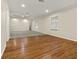 Spacious living room featuring hardwood flooring, recessed lighting, and ceiling fan at 4515 N. Slope Cir, Marietta, GA 30066