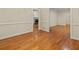 Spacious living area with hardwood floors, neutral paint, and multiple entryways at 4515 N. Slope Cir, Marietta, GA 30066