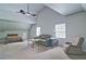 Huge bonus room featuring high ceilings, soft carpet, and windows providing natural light at 5800 Villa Rica Hwy, Dallas, GA 30157