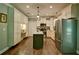 Modern kitchen with stainless steel appliances, a kitchen island, and custom cabinets at 5800 Villa Rica Hwy, Dallas, GA 30157