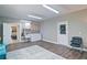 Functional laundry room featuring a washer, dryer, utility sink, and cabinetry, leading to bedroom at 5800 Villa Rica Hwy, Dallas, GA 30157