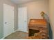 A compact office space adjacent to the main bedroom, featuring an antique desk and storage space at 5800 Villa Rica Hwy, Dallas, GA 30157