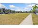 Expansive community greenspace with walking path and multiple buildings surrounding at 1225 Westshore Dr, Cumming, GA 30041