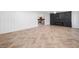 Spacious, open concept living room features new floors, an electric fireplace, and recessed lighting at 1225 Westshore Dr, Cumming, GA 30041