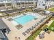 Community pool aerial view featuring modern lounge chairs and manicured landscaping at 1225 Westshore Dr, Cumming, GA 30041
