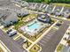 Aerial view of the community pool with ample lounge seating and parking at 1225 Westshore Dr, Cumming, GA 30041