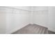 Walk-in closet with carpet, shelving, and plenty of storage space at 1225 Westshore Dr, Cumming, GA 30041