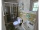 Cozy bathroom features a shower with glass door and tiled walls at 1810 Trophy Dr, Marietta, GA 30062