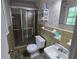 Cozy bathroom features a shower with glass door and tiled walls at 1810 Trophy Dr, Marietta, GA 30062