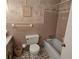Traditional bathroom features a shower-tub combo and floral wallpaper at 1810 Trophy Dr, Marietta, GA 30062