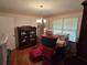 Dining room with decorative wallpaper, ample storage, and natural light from the window at 1810 Trophy Dr, Marietta, GA 30062