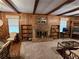 Living room area with brick fireplace and built-in bookshelves at 1810 Trophy Dr, Marietta, GA 30062