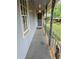 The porch features a black metal railing and room for seating at 1810 Trophy Dr, Marietta, GA 30062
