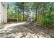 Backyard features a shed and a basketball hoop surrounded by trees, offering a private outdoor space at 2055 Deans Landing Dr, Lawrenceville, GA 30043