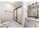 Full bathroom with granite counters, shower with glass doors, and modern fixtures at 2055 Deans Landing Dr, Lawrenceville, GA 30043