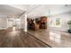 Open-concept living space combining the kitchen, dining and living areas for seamless entertaining at 2055 Deans Landing Dr, Lawrenceville, GA 30043