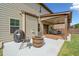 A house featuring a back patio with a fire pit, overlooking the backyard at 2435 Sentinel Chase Way, Cumming, GA 30041