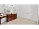 A bright bathroom featuring a large vanity and plenty of space at 2435 Sentinel Chase Way, Cumming, GA 30041