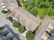 Aerial view of townhome complex with well-maintained landscaping and ample parking at 2801 Avington Se Ln, Smyrna, GA 30080