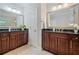 Bathroom featuring dual vanities, granite countertops and modern fixtures at 2801 Avington Se Ln, Smyrna, GA 30080