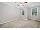 Bright and airy bedroom with neutral carpet and ample natural light at 2801 Avington Se Ln, Smyrna, GA 30080