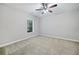 The bedroom features a neutral wall color, carpet and a ceiling fan at 2801 Avington Se Ln, Smyrna, GA 30080