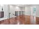 A hallway featuring gleaming hardwood floors and traditional-style banister at 2801 Avington Se Ln, Smyrna, GA 30080